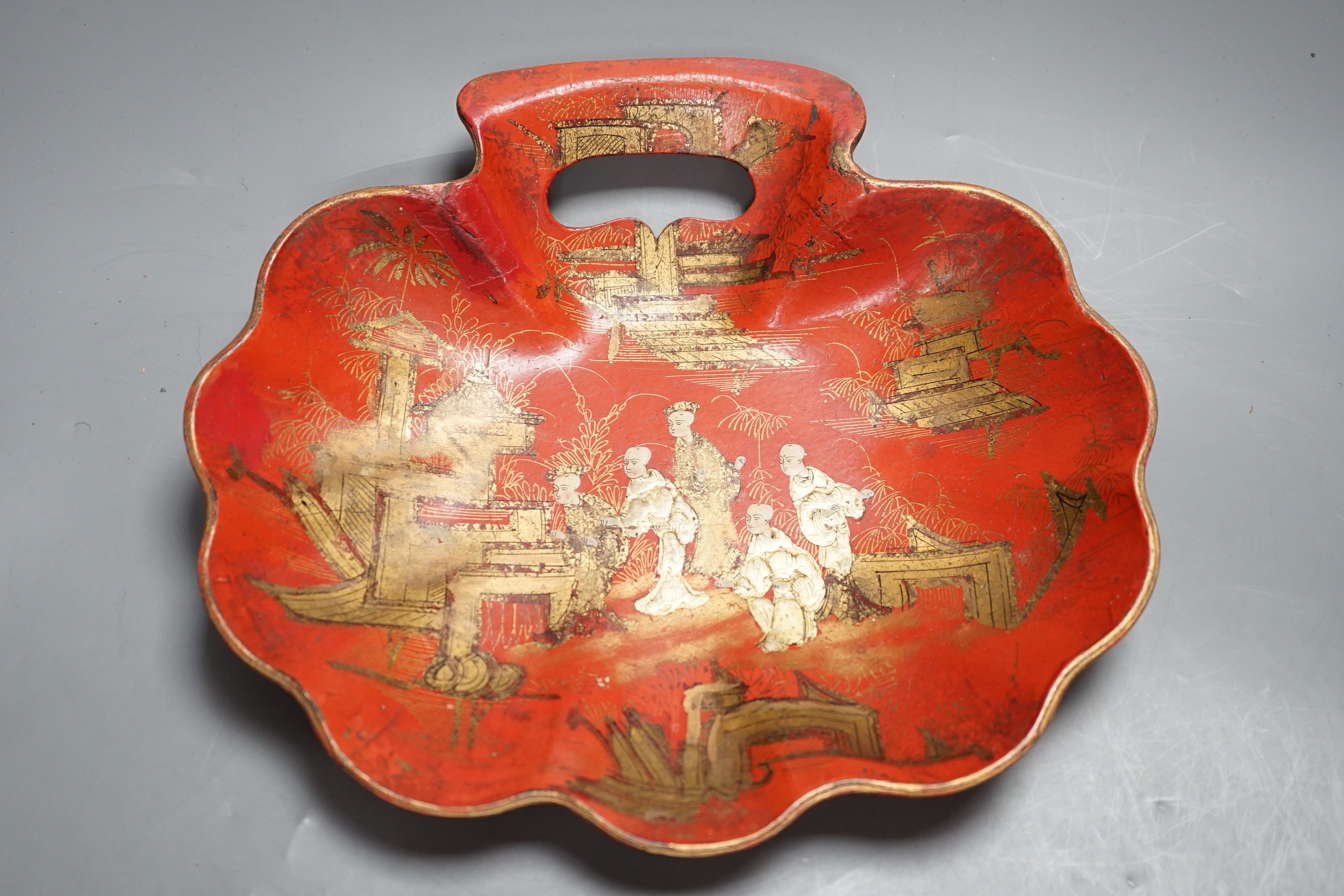 Two early 20th century japanned scallop shell dishes. 29cm wide